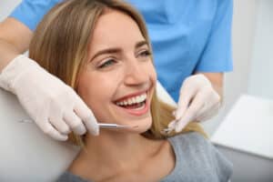 female being examined by an endodontist