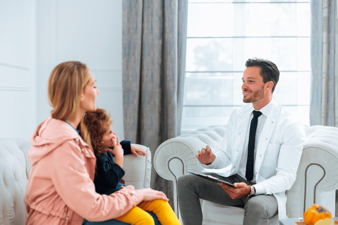 dentist showing x-ray to patient graham